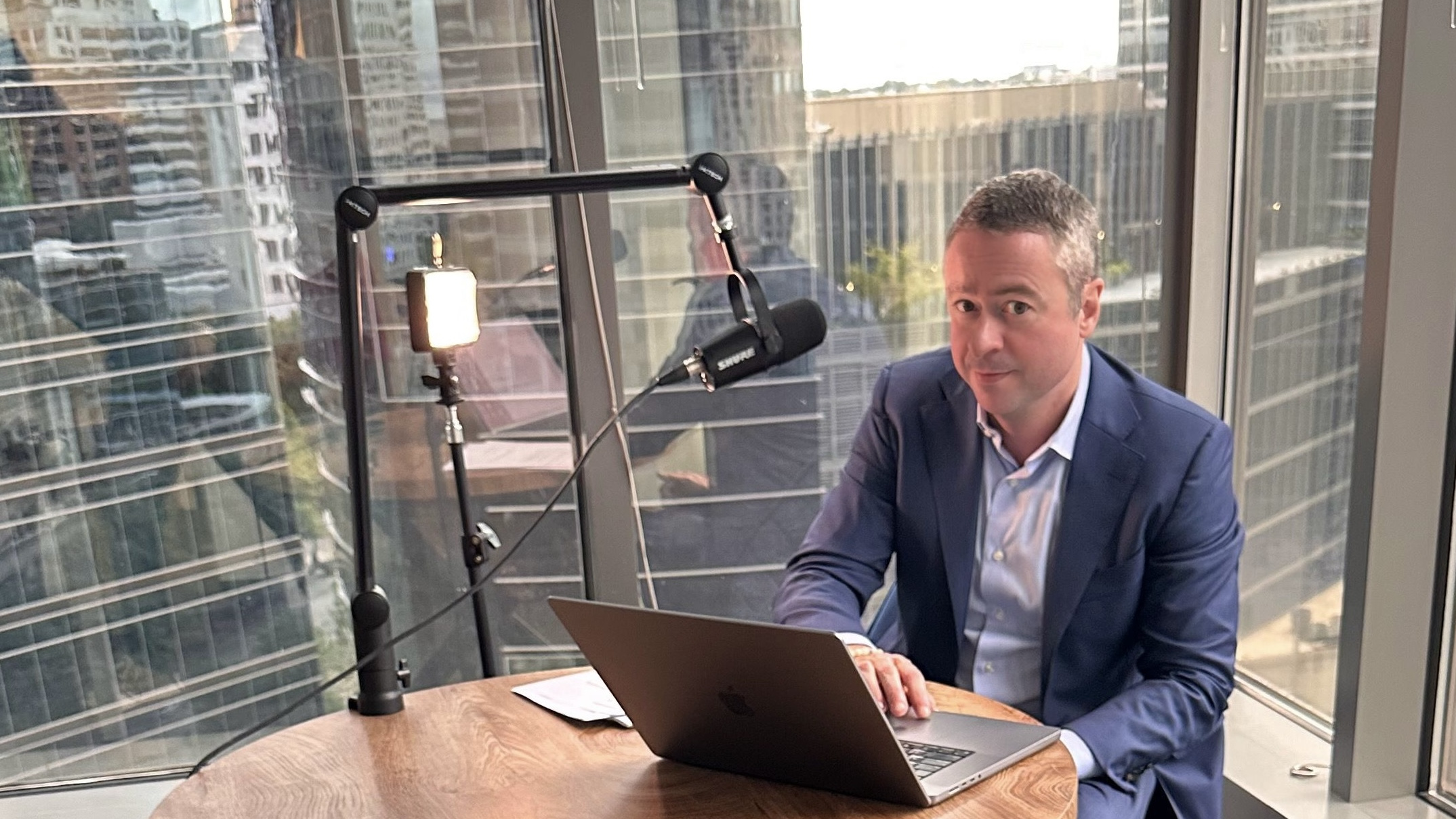 Shaun Southworth recording a podcast at a desk in Atlanta